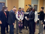 [Board of Trustees & Administrators Laying Hands on Interim President Pete C. Menjares, 2021 (Photograph no. 1)] by Seattle Pacific University