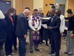 [Board of Trustees & Administrators Laying Hands on Interim President Pete C. Menjares, 2021 (Photograph no. 2)] by Seattle Pacific University