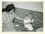 Holding Baby Brother, 1952 by unknown unknown